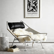 Modern Lounge Chair with Wool Throw and Leather Head Pillow